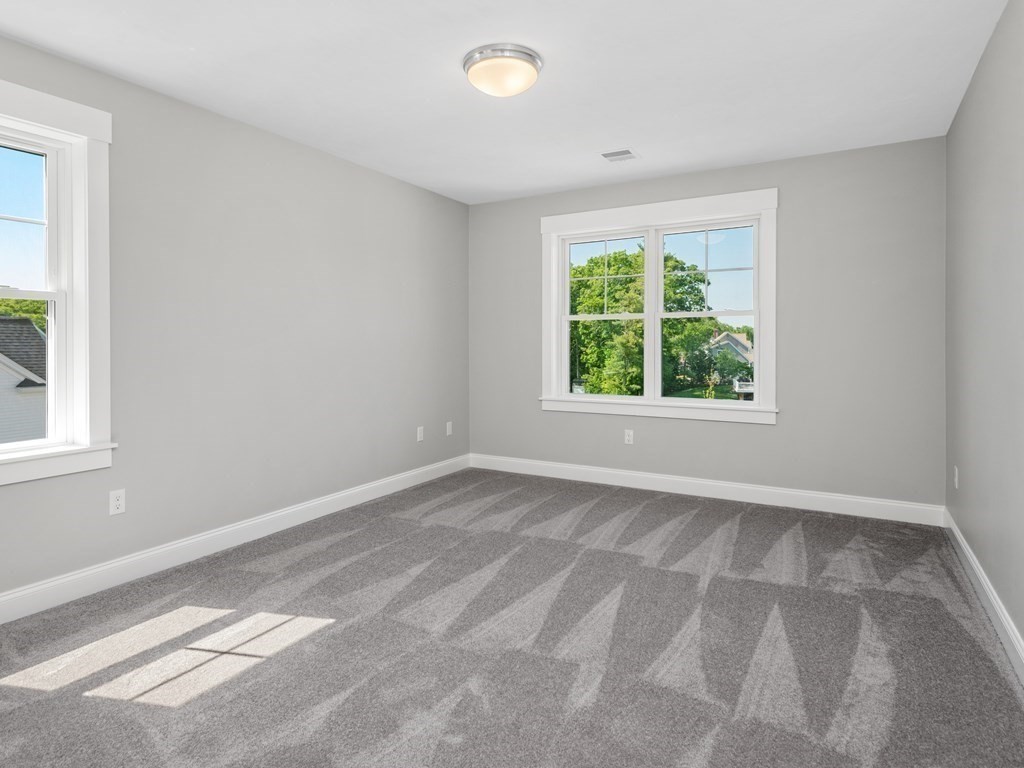 87 Brigham Hill Road Attleboro, MA 02703 - Photo 34 of 42 a view of an empty room with a window
