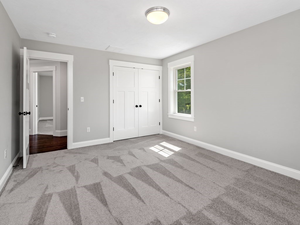 87 Brigham Hill Road Attleboro, MA 02703 - Photo 40 of 42 an empty room with windows and closet