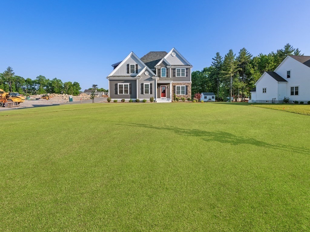 87 Brigham Hill Road Attleboro, MA 02703 - Photo 41 of 42 a front view of a house with garden