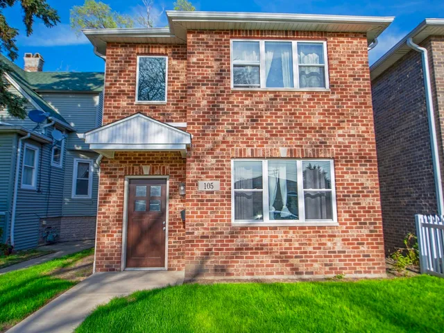 a brick building with a large windows
