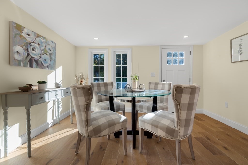 15 Red Acre Road Stow, MA 01775 - Photo 17 of 42 a view of a dining room with furniture and wooden floor