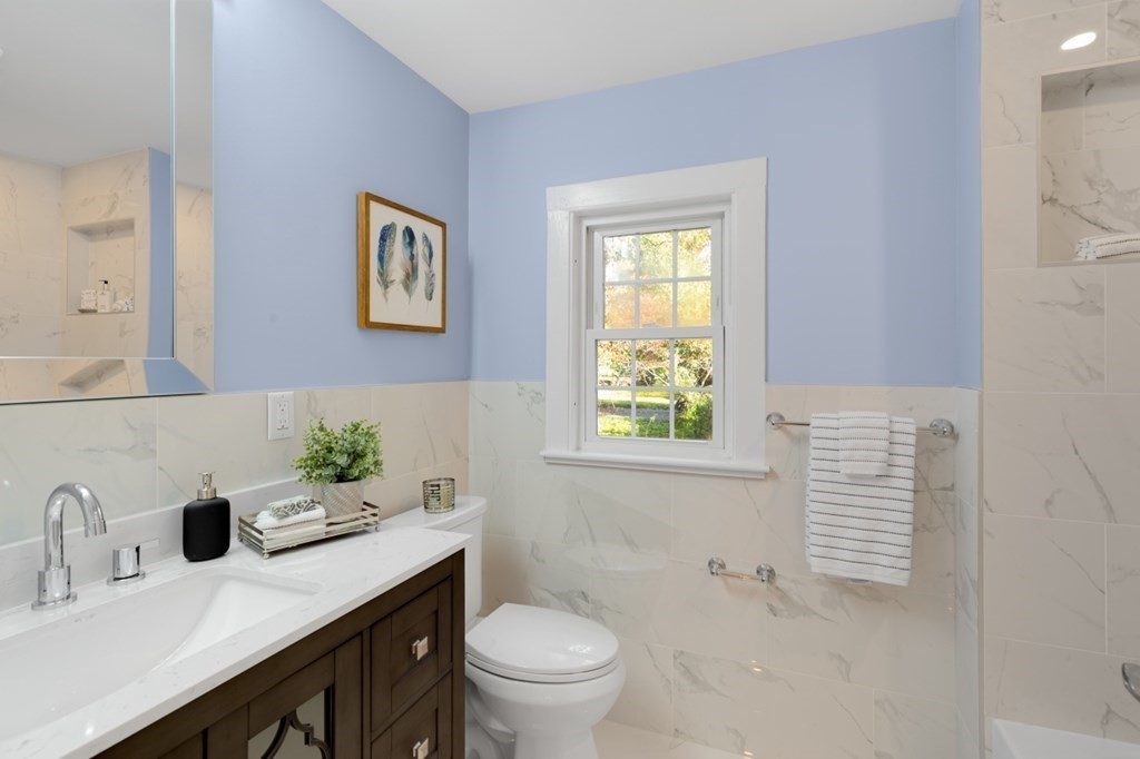 15 Red Acre Road Stow, MA 01775 - Photo 24 of 42 a bathroom with a sink toilet and a mirror
