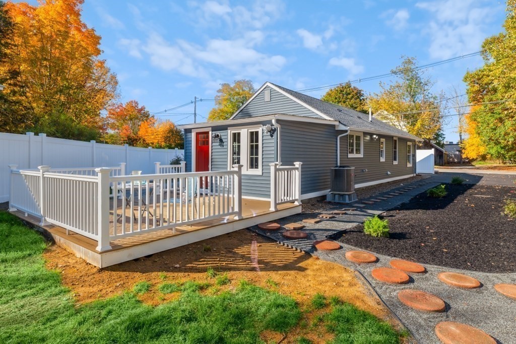 15 Red Acre Road Stow, MA 01775 - Photo 30 of 42 a view of a house with backyard and porch