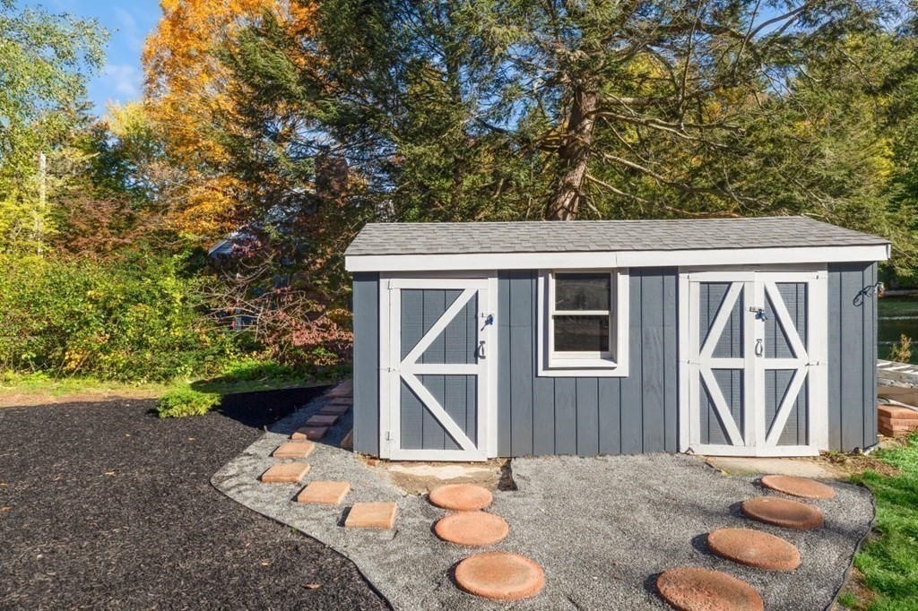 15 Red Acre Road Stow, MA 01775 - Photo 34 of 42 a front view of a house with garden