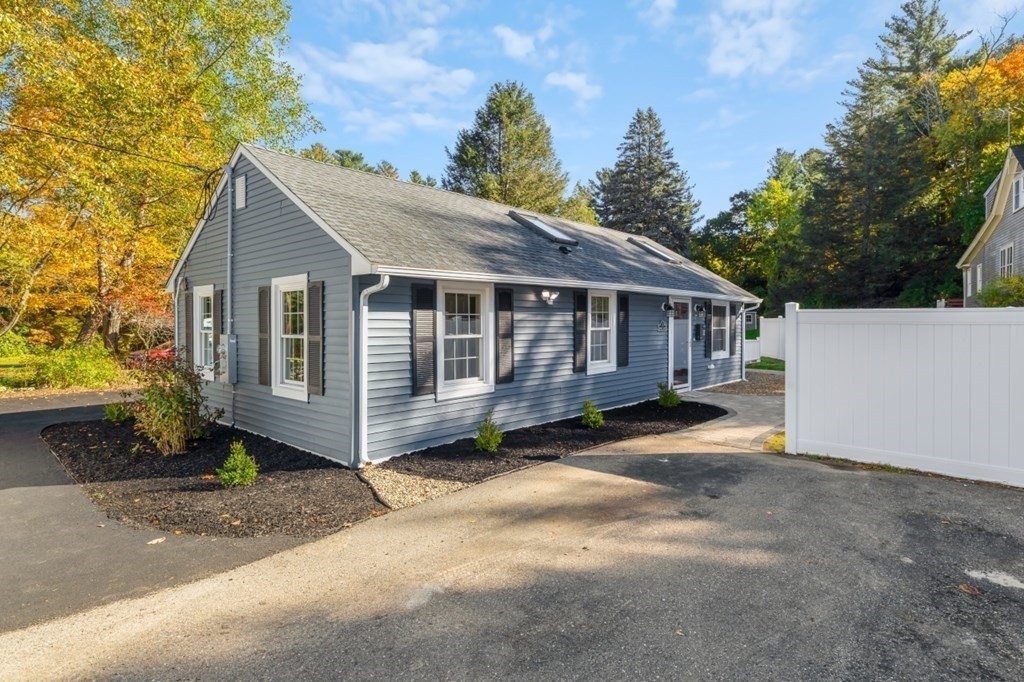 15 Red Acre Road Stow, MA 01775 - Photo 4 of 42 a house with trees in the background