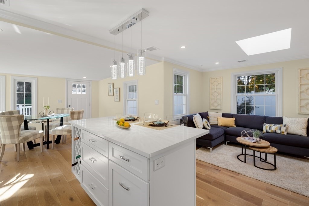 15 Red Acre Road Stow, MA 01775 - Photo 9 of 42 a view of center island dining table and chairs