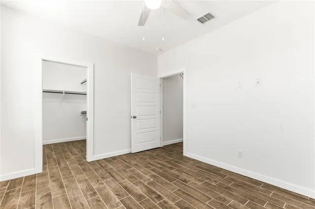 a view of a room with racks on the wall