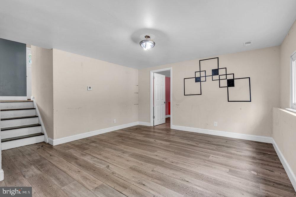 211 Chatham Drive Lindenwold, NJ 08021 - Photo 28 of 42 a view of empty room with wooden floor