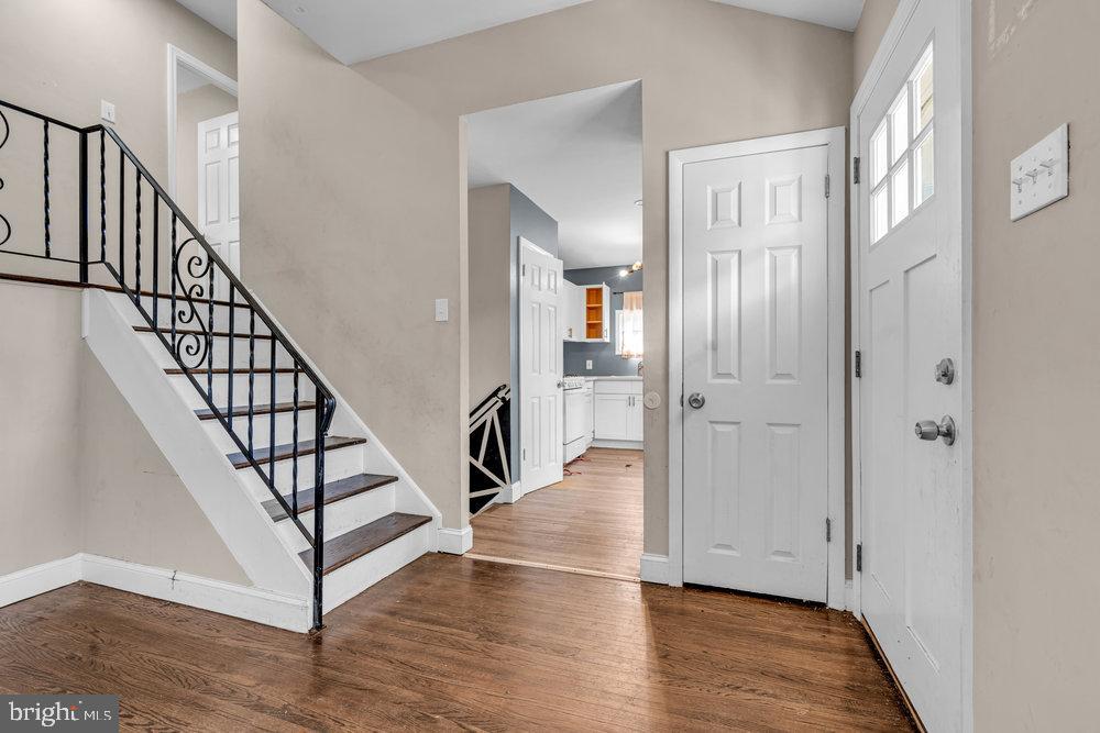 211 Chatham Drive Lindenwold, NJ 08021 - Photo 6 of 42 a view of a hallway with wooden floor and entryway