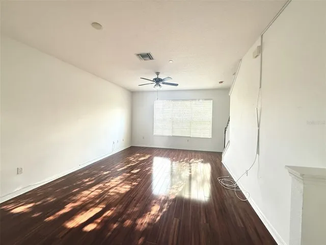 a view of an empty room and window