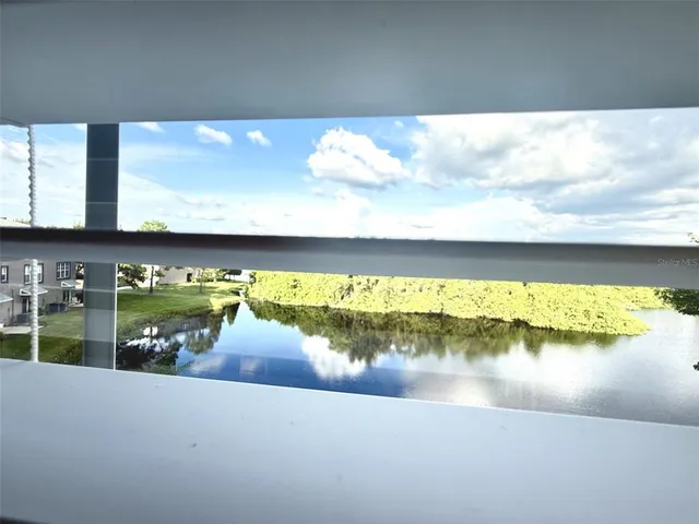 a view of a lake from a city