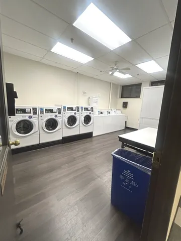 a kitchen with stainless steel appliances a stove a microwave and a refrigerator