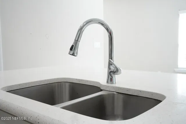 a view of a sink and tub