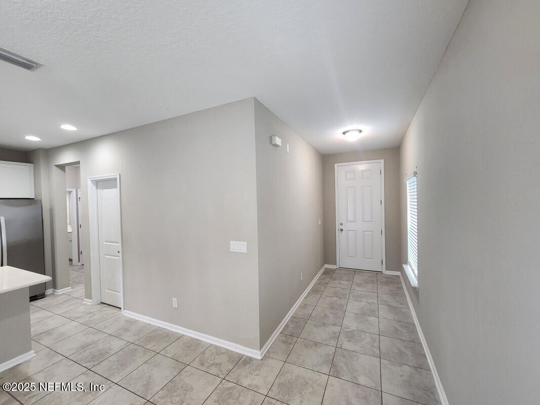 855 Sycamore Way Orange Park, FL 32073 - Photo 16 of 43 a view of a hallway
