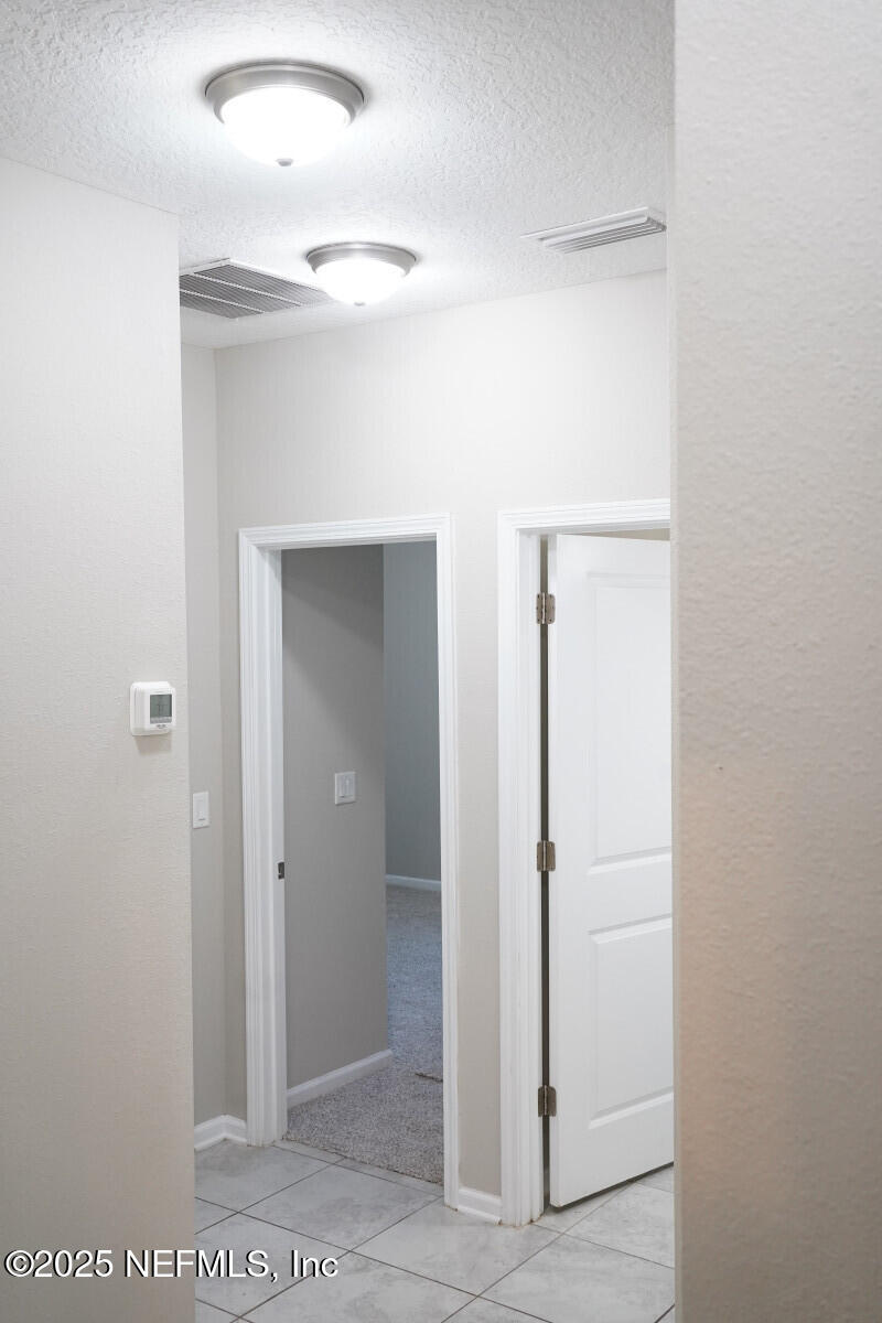 855 Sycamore Way Orange Park, FL 32073 - Photo 28 of 43 a bathroom with a shower and a sink