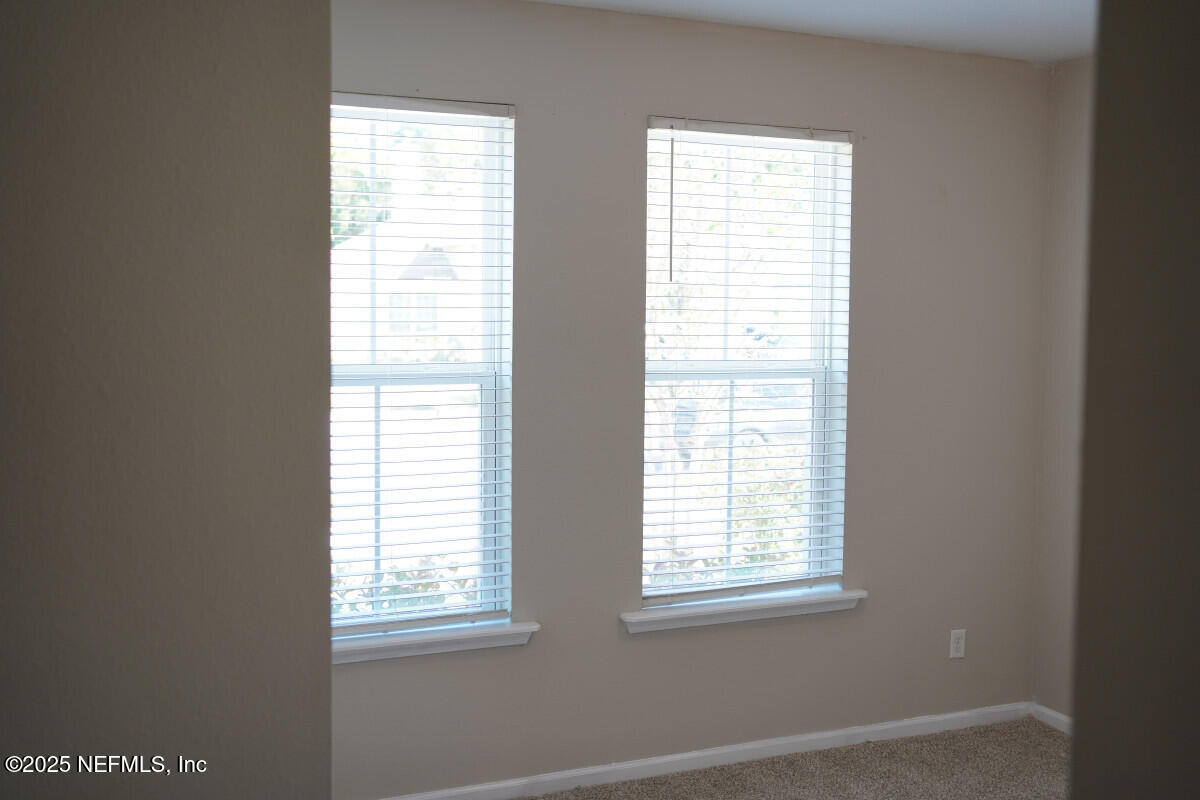 855 Sycamore Way Orange Park, FL 32073 - Photo 29 of 43 a view of an empty room with a window