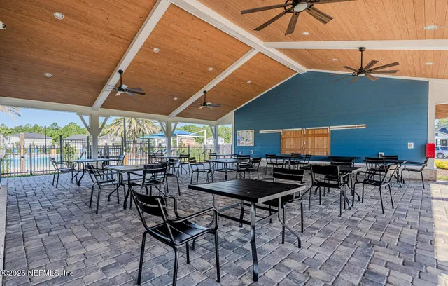 a view of a swimming pool and outdoor space