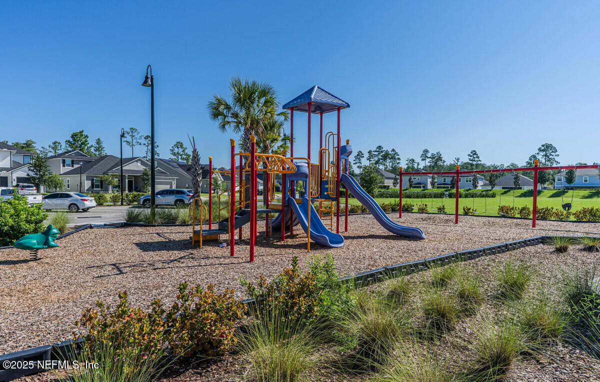 855 Sycamore Way Orange Park, FL 32073 - Photo 39 of 43 a view of outdoor space with swimming pool and slide