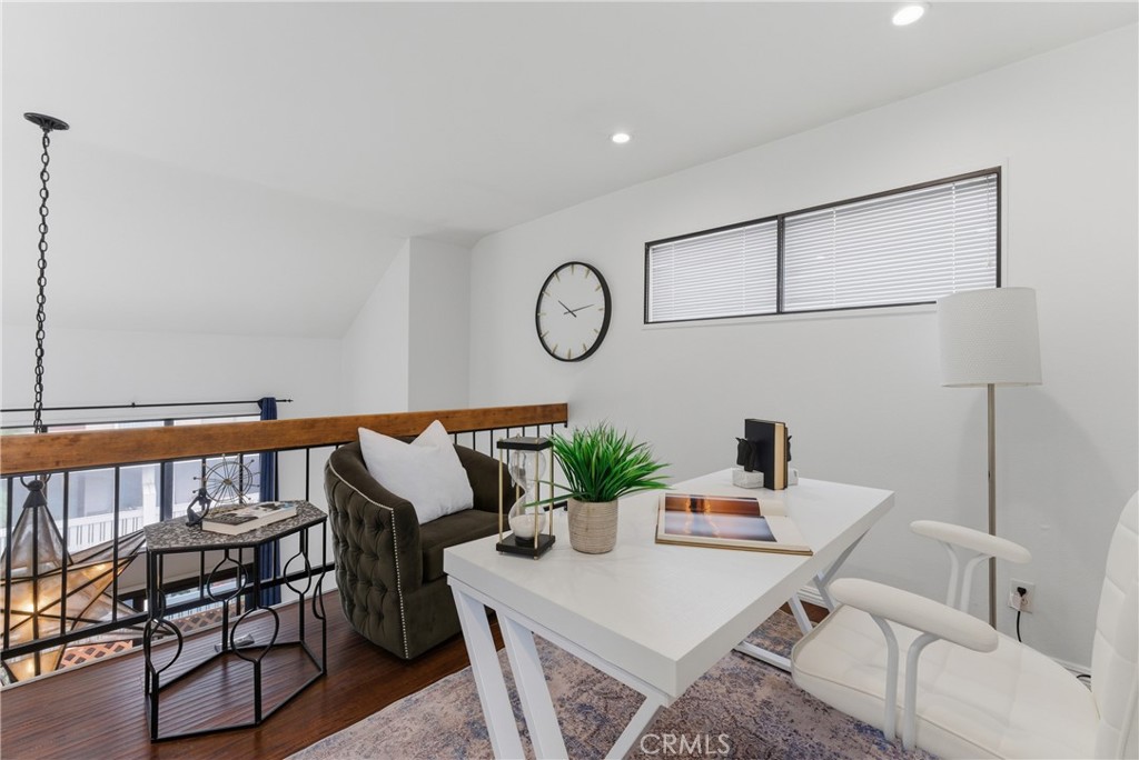 8180 Manitoba Street, Unit 330 Playa del Rey, CA 90293 - Photo 25 of 31 a view of a dining room with furniture and wooden floor