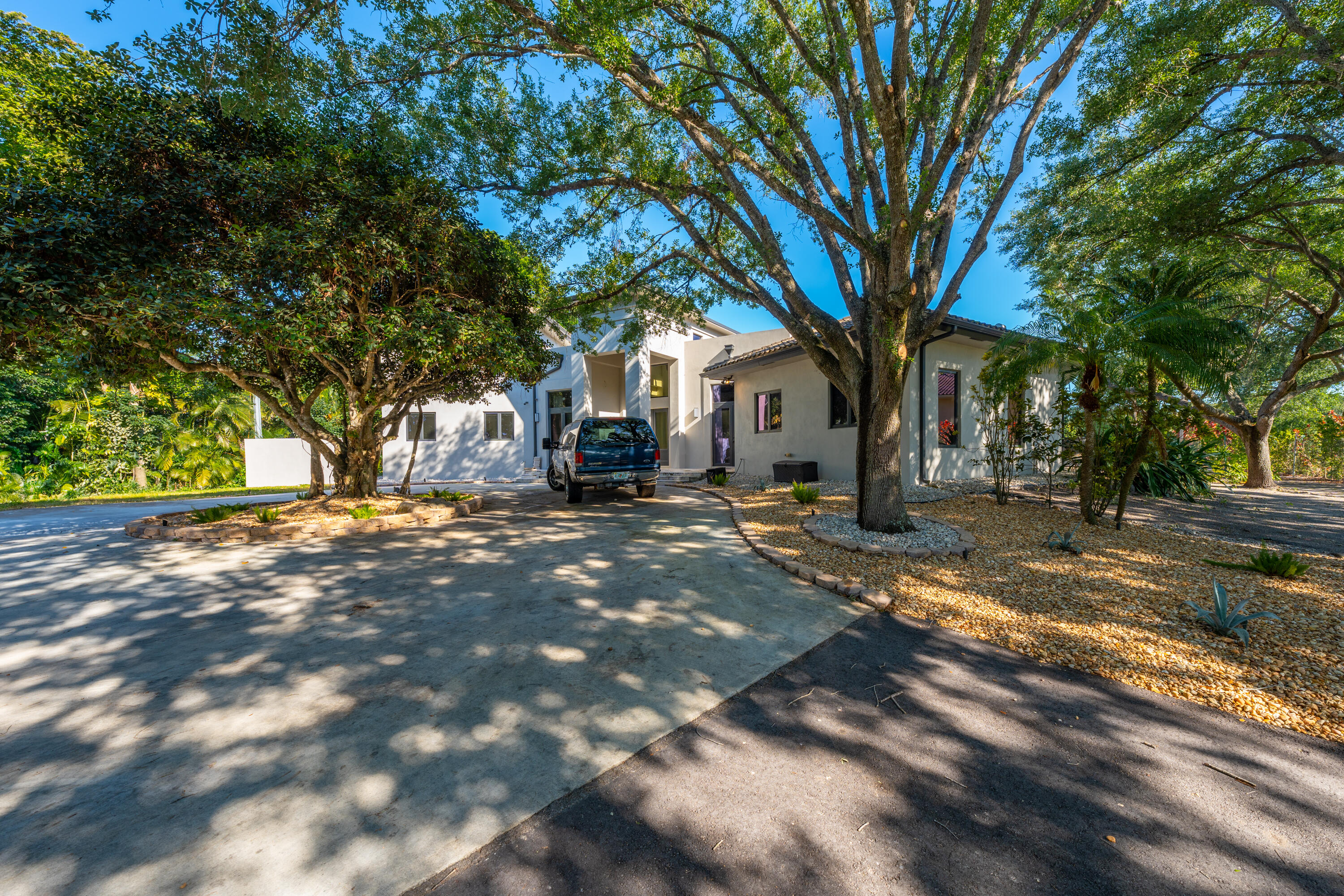 13451 Luray Road Southwest Ranches, FL 33330 - Photo 54 of 55 a view of road with trees