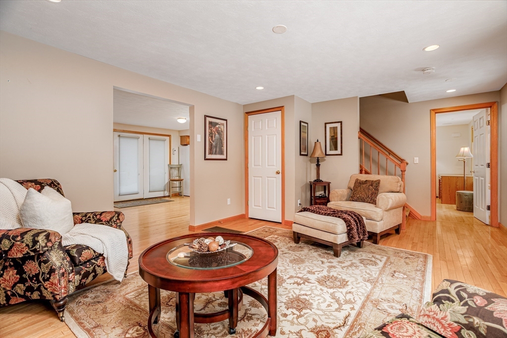 326 Matthews Street Gardner, MA 01440 - Photo 13 of 42 a living room with furniture and a wooden floor