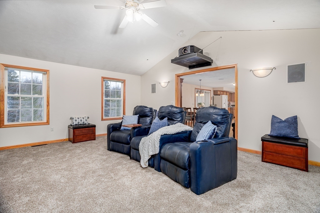 326 Matthews Street Gardner, MA 01440 - Photo 17 of 42 a living room with furniture and a lamp