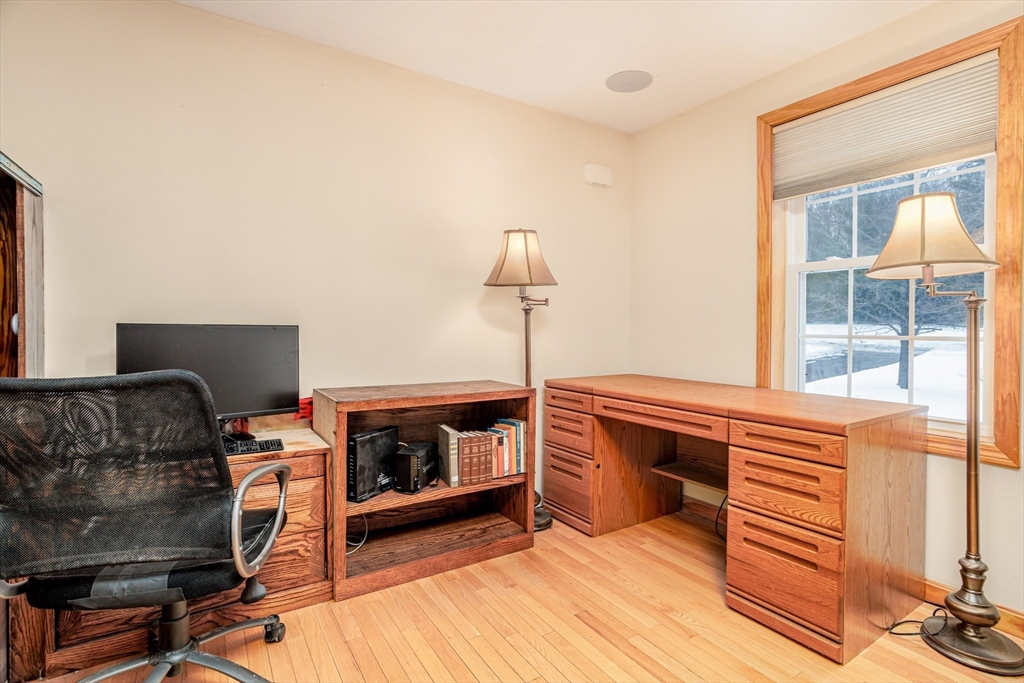 326 Matthews Street Gardner, MA 01440 - Photo 20 of 42 a living room with furniture a fireplace and a flat screen tv