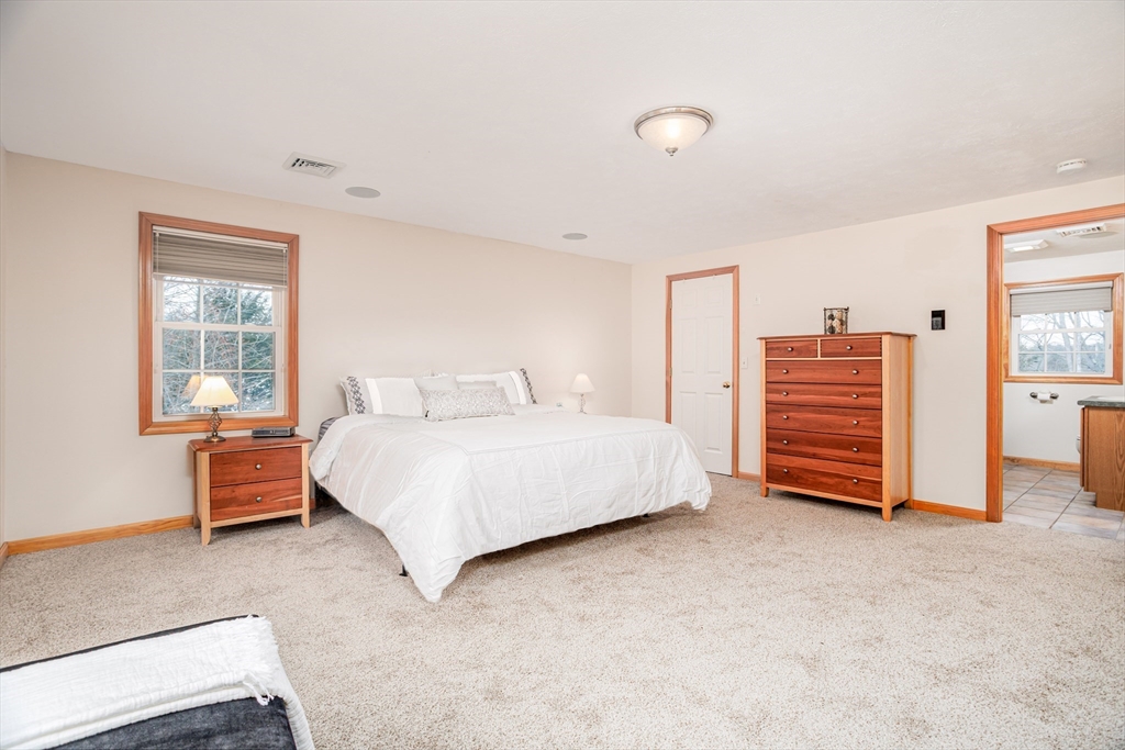 326 Matthews Street Gardner, MA 01440 - Photo 24 of 42 a bedroom with a bed and a couch