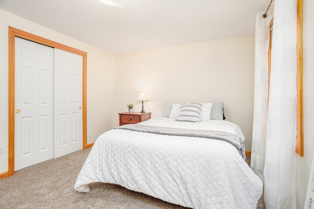 326 Matthews Street Gardner, MA 01440 - Photo 32 of 42 a bedroom with a bed and a window