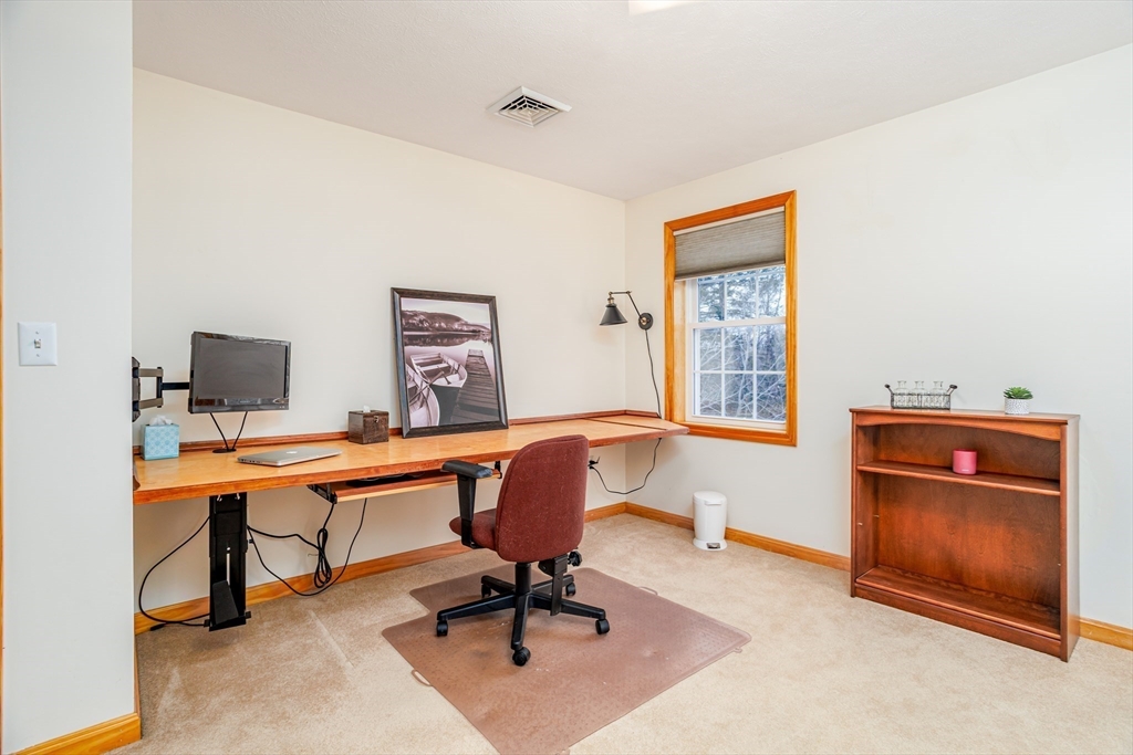 326 Matthews Street Gardner, MA 01440 - Photo 35 of 42 a view of a workspace with furniture and a window