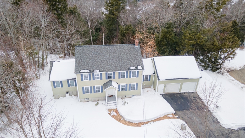 326 Matthews Street Gardner, MA 01440 - Photo 40 of 42 an aerial view of a house with swimming pool and sitting area