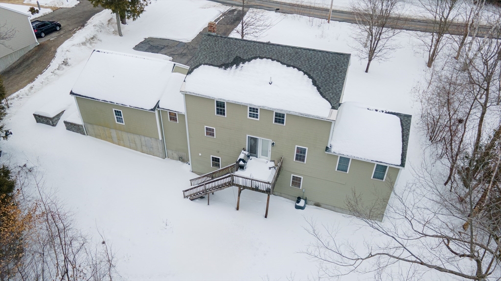 326 Matthews Street Gardner, MA 01440 - Photo 42 of 42 a balcony with table and chairs