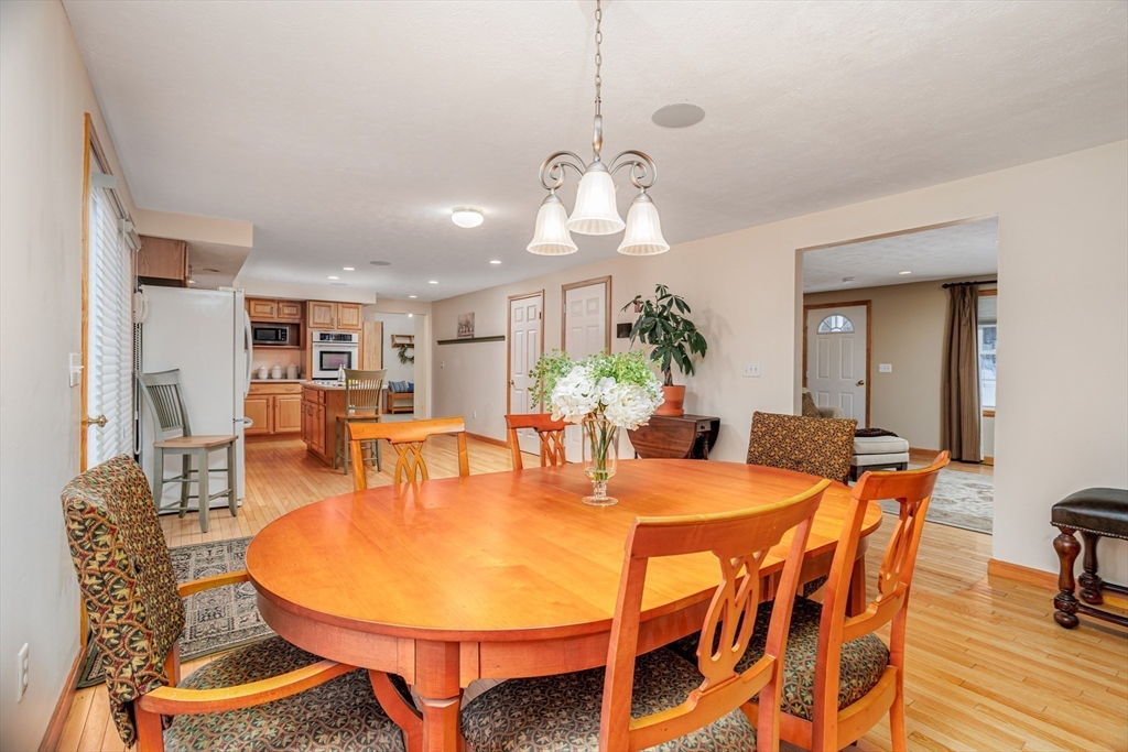 326 Matthews Street Gardner, MA 01440 - Photo 9 of 42 a dining room with furniture and wooden floor