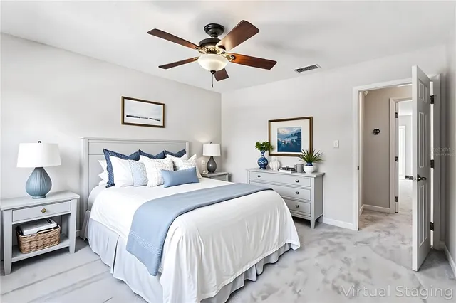 a bed room with a bed and a tv