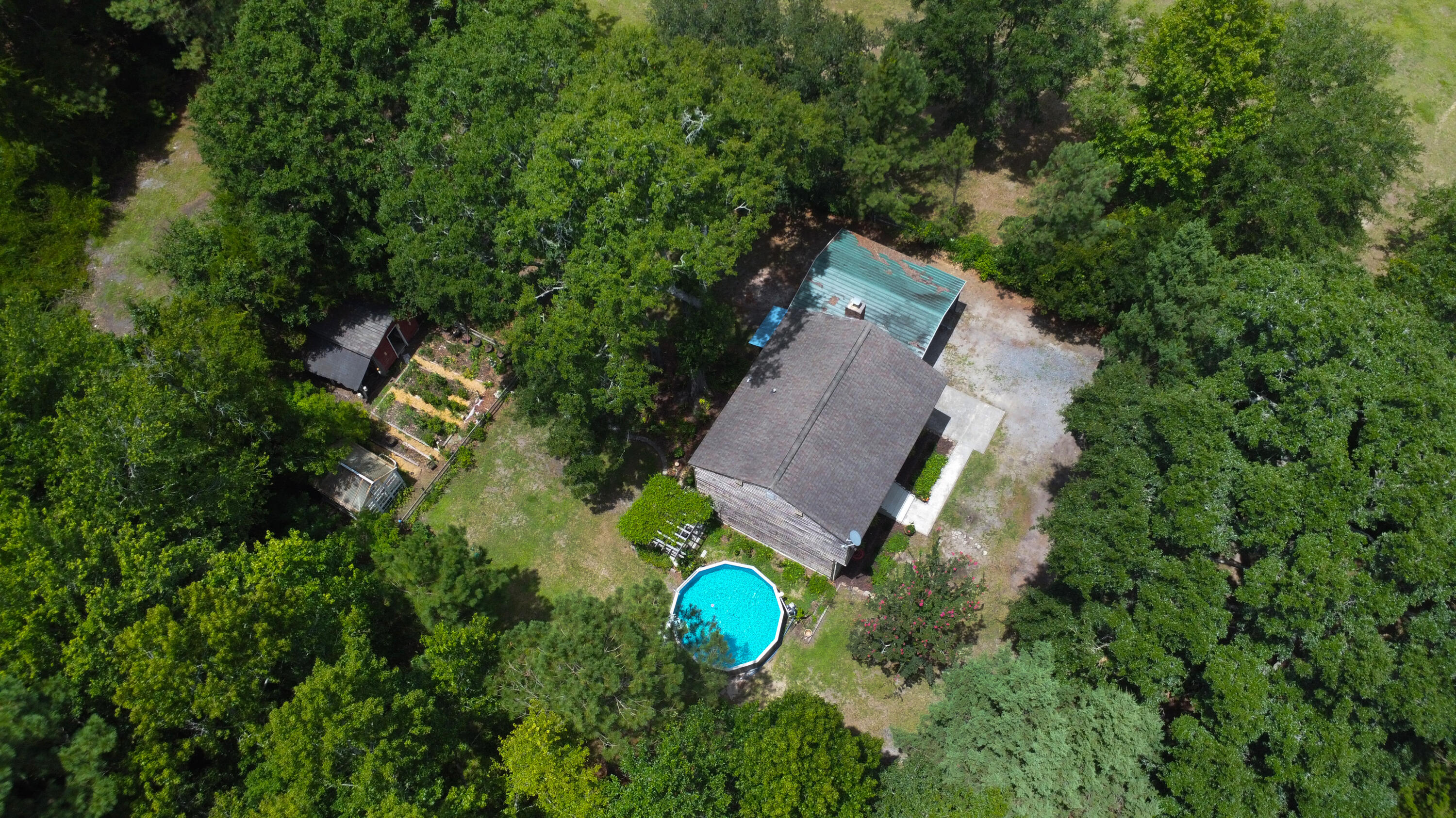 6374 Maxville Road Awendaw, SC 29429 - Photo 3 of 25 3-house-pool-garden-6374-maxville-rd-awe