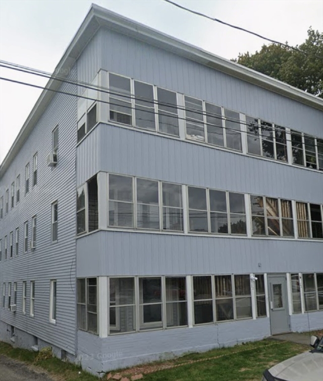 a large building with a yard