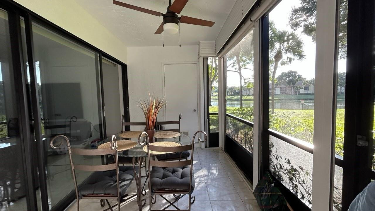 2289 Southwest 15th Street, Unit 129 Deerfield Beach, FL 33442 - Photo 27 of 41 a view of a dining room with furniture window and outside view