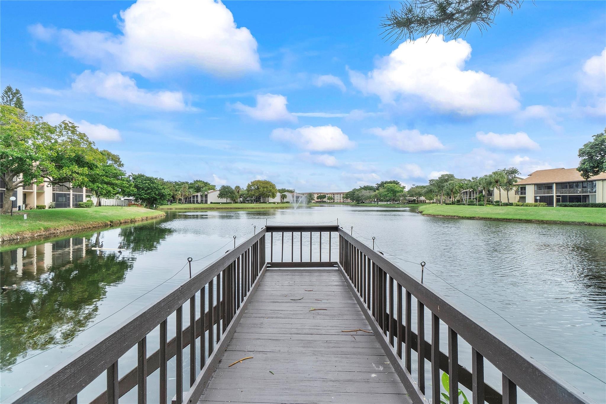 2289 Southwest 15th Street, Unit 129 Deerfield Beach, FL 33442 - Photo 30 of 41 a view of lake and balcony