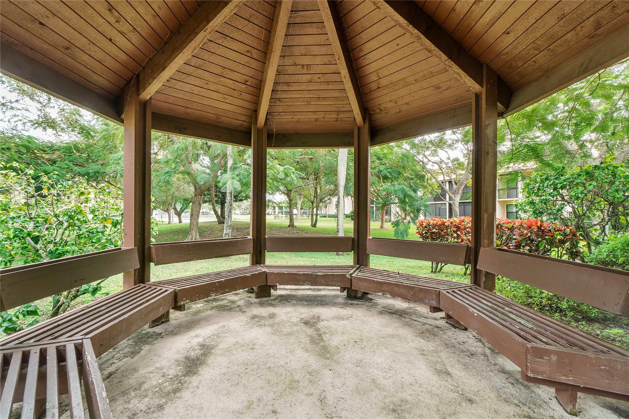 2289 Southwest 15th Street, Unit 129 Deerfield Beach, FL 33442 - Photo 31 of 41 a view of sitting area in the back yard