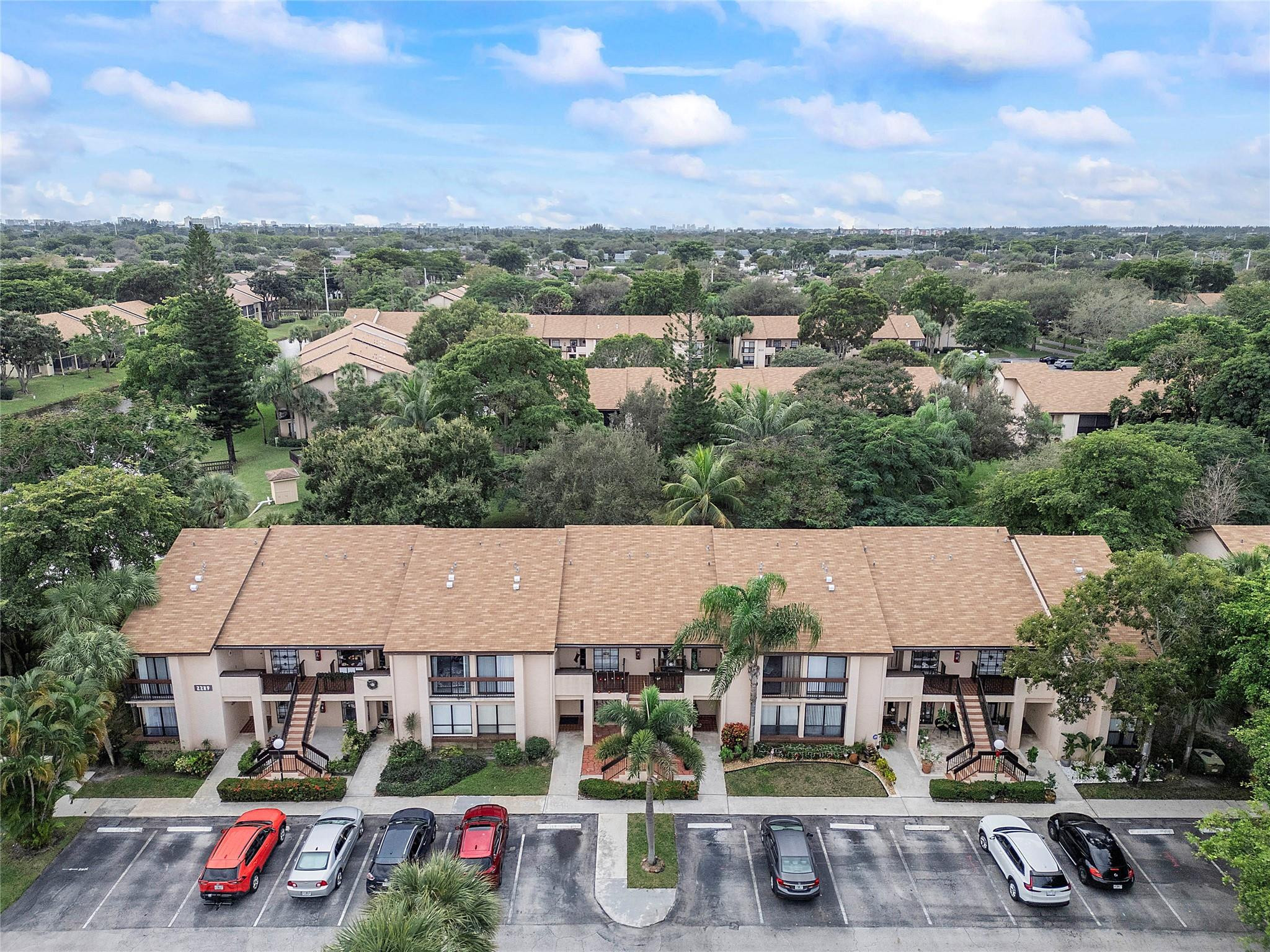 2289 Southwest 15th Street, Unit 129 Deerfield Beach, FL 33442 - Photo 40 of 41 an aerial view of multiple houses