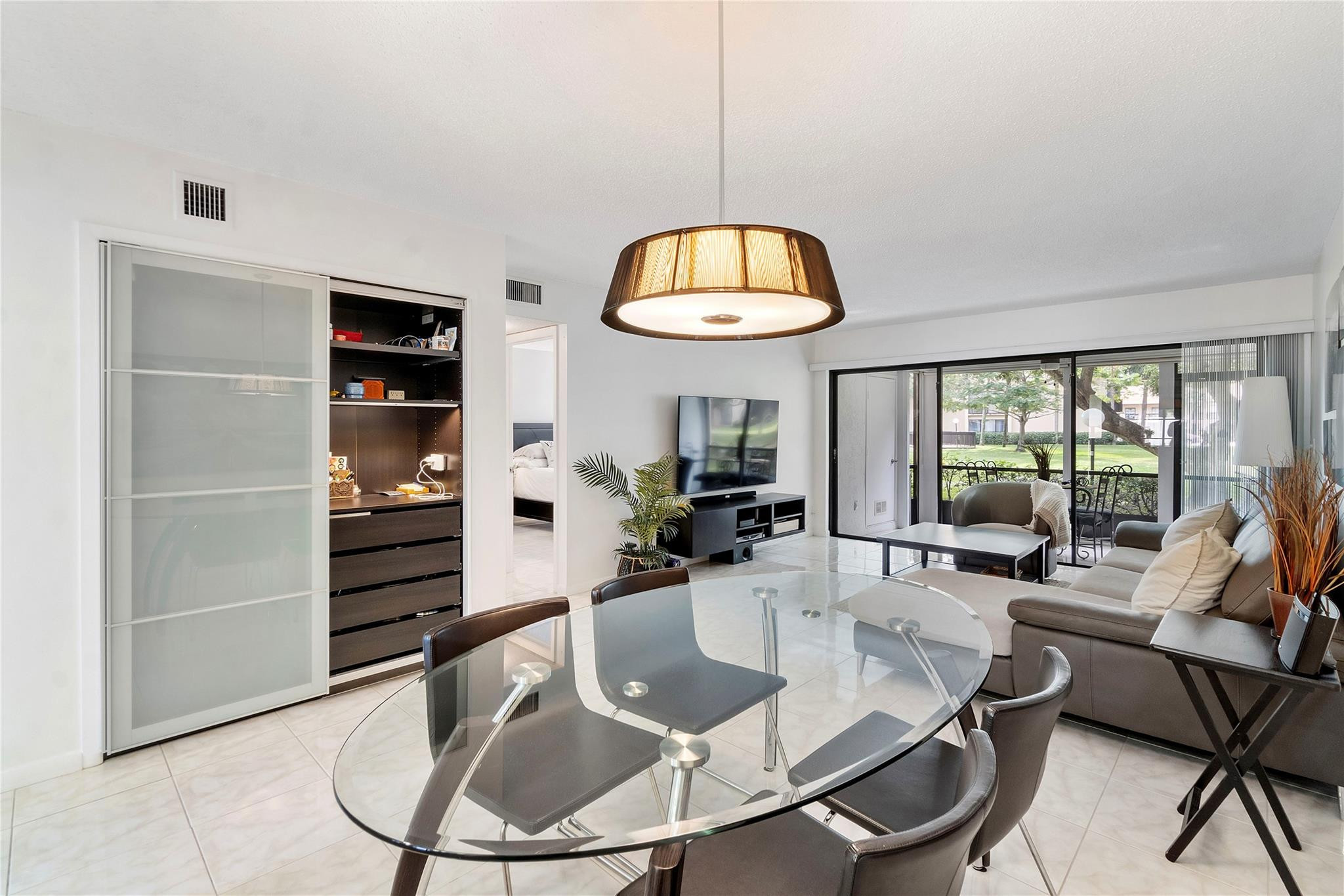 2289 Southwest 15th Street, Unit 129 Deerfield Beach, FL 33442 - Photo 10 of 41 a living room with furniture