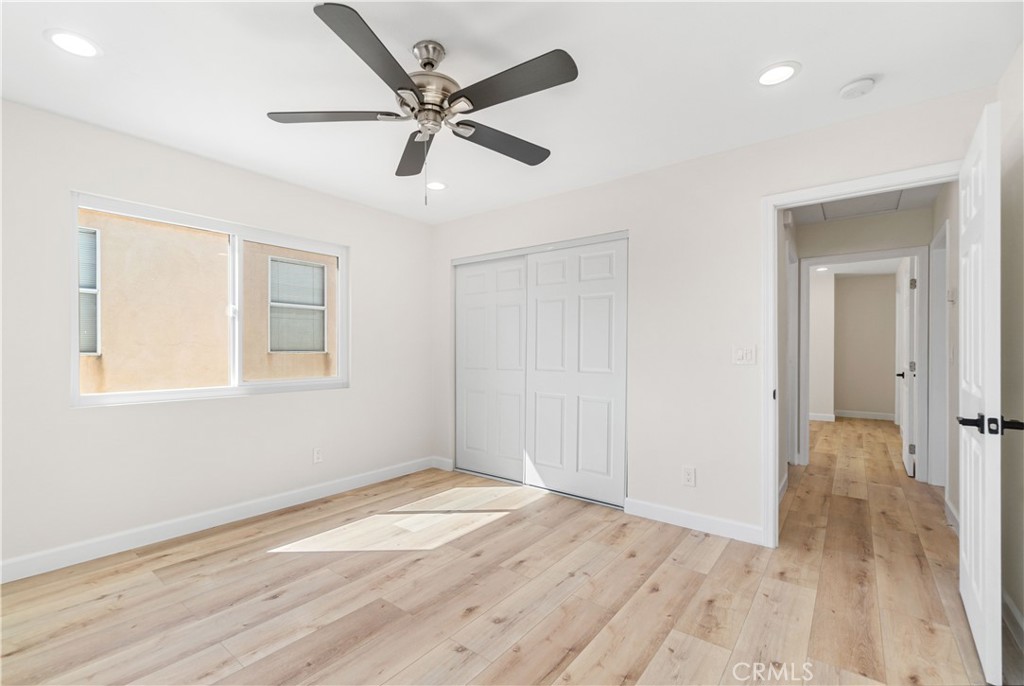 523 West 12th Street, Unit 4 San Pedro, CA 90731 - Photo 16 of 18 wooden floor in an empty room with a window