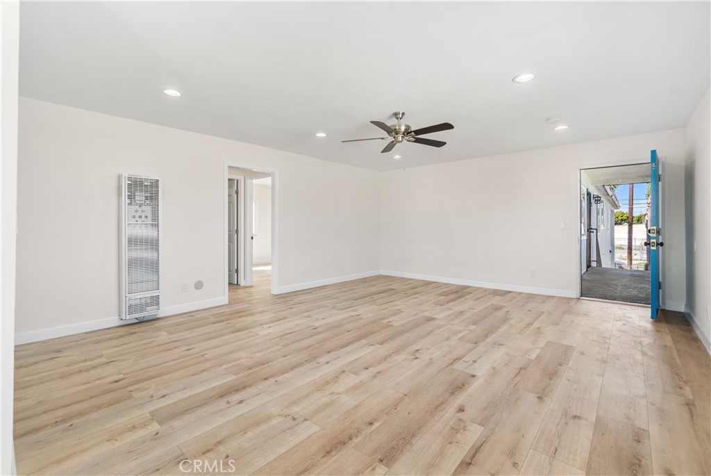 523 West 12th Street, Unit 4 San Pedro, CA 90731 - Photo 6 of 18 a view of empty room with wooden floor