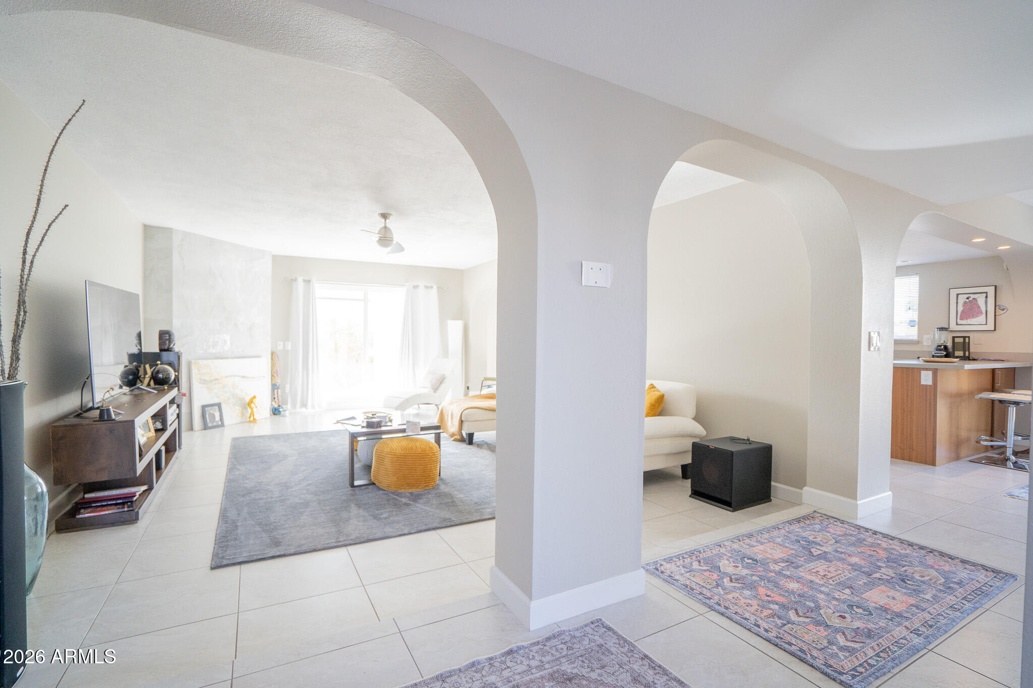 1201 East Rowlands Lane Phoenix, AZ 85022 - Photo 12 of 40 a living room with furniture and a rug