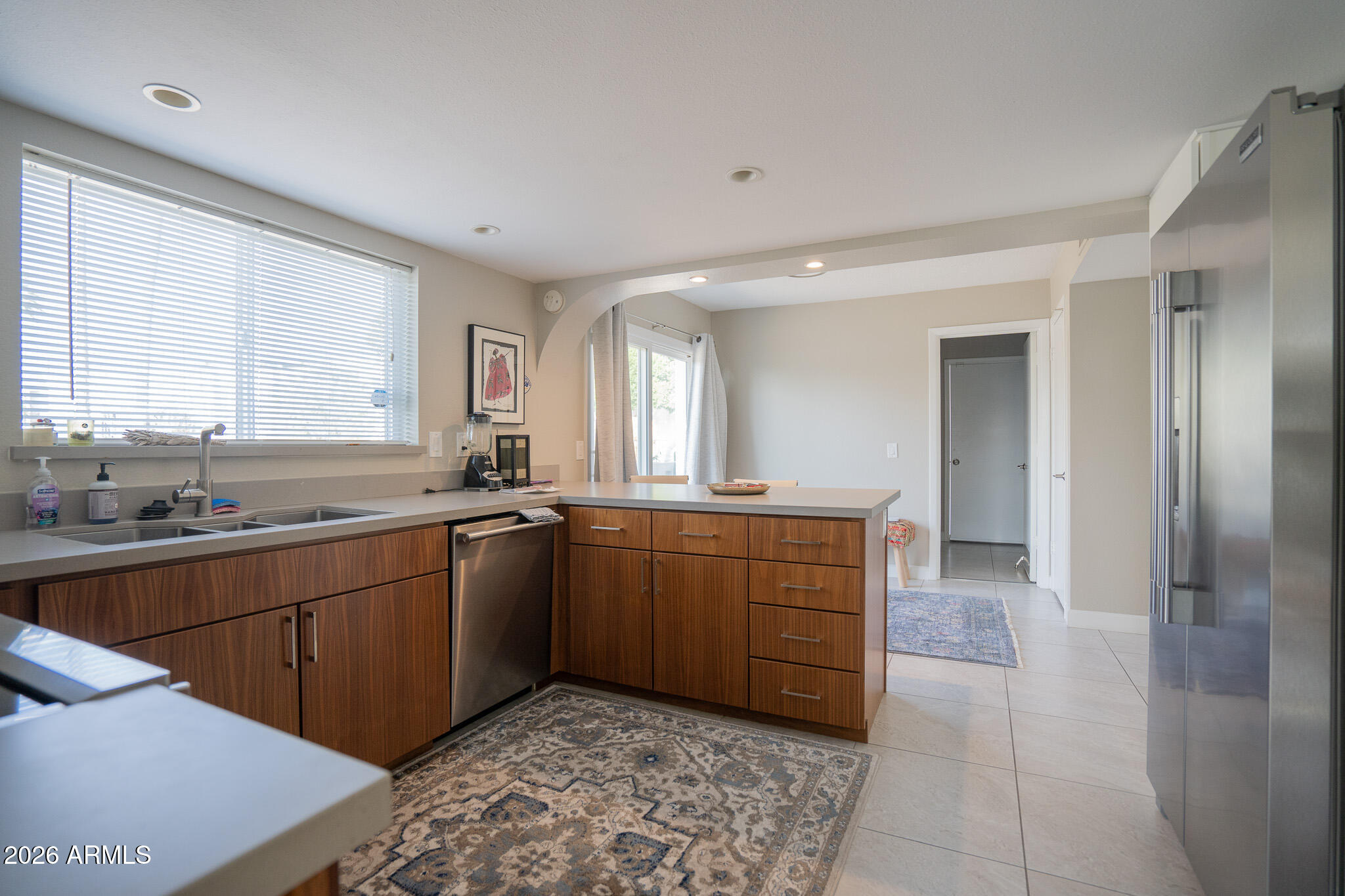 1201 East Rowlands Lane Phoenix, AZ 85022 - Photo 19 of 40 a large bathroom with a sink and a mirror