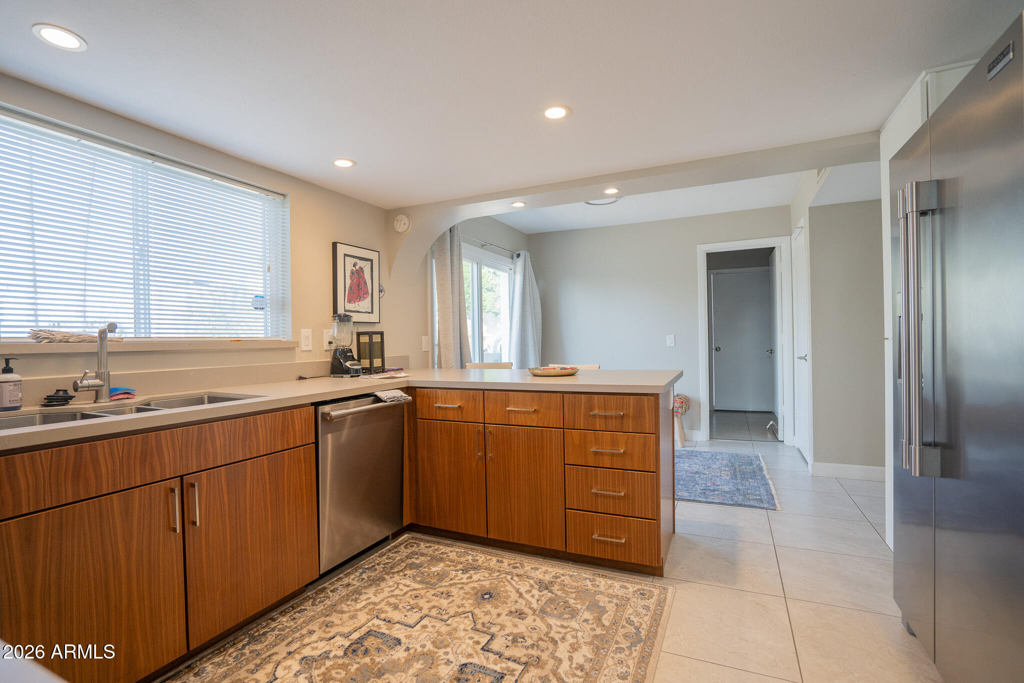1201 East Rowlands Lane Phoenix, AZ 85022 - Photo 21 of 40 a large bathroom with a sink and a mirror