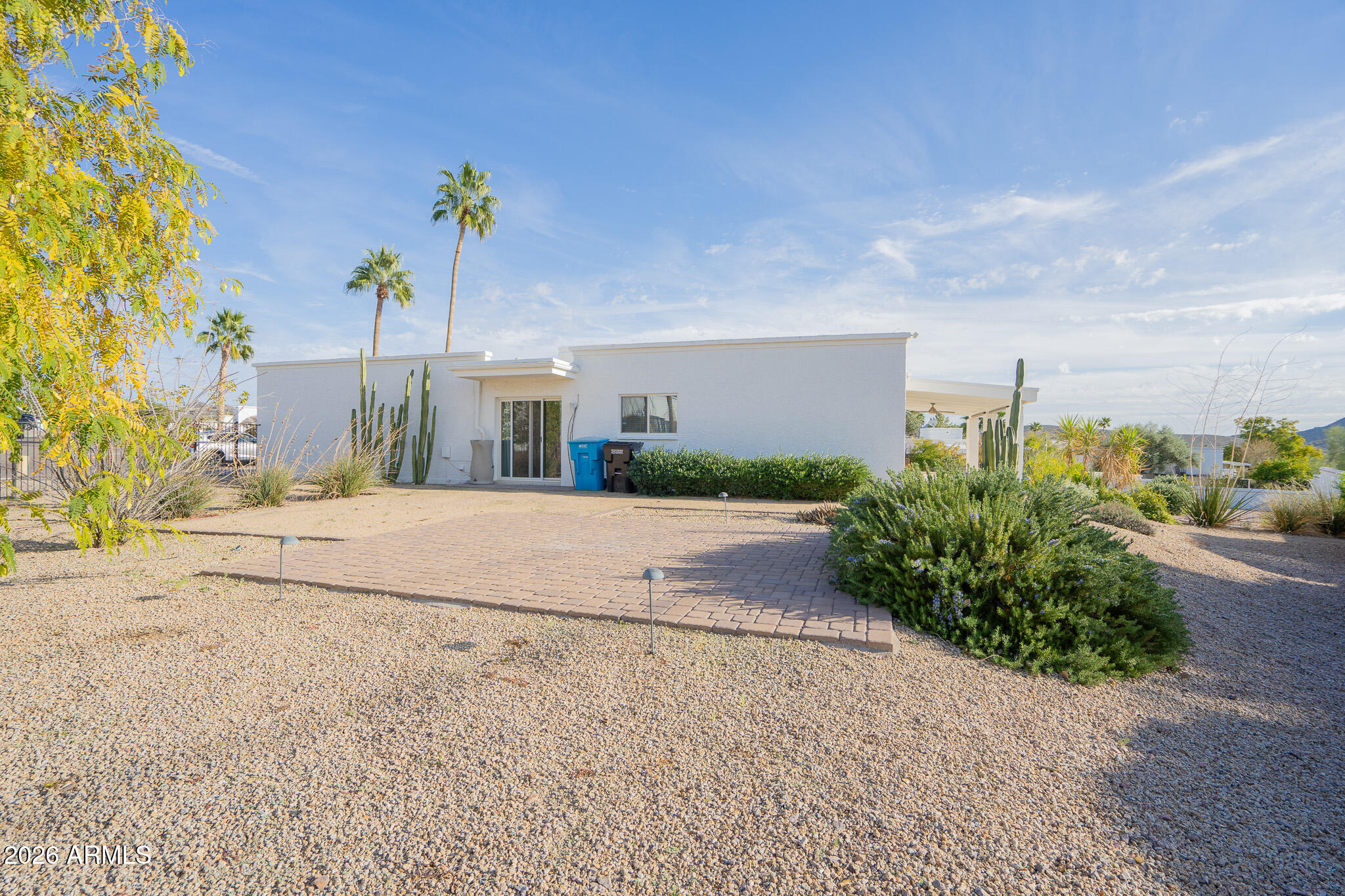 1201 East Rowlands Lane Phoenix, AZ 85022 - Photo 34 of 40 a view of a street with a building in the background