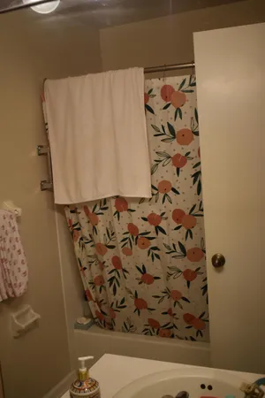 a view of a chair and tables in the balcony