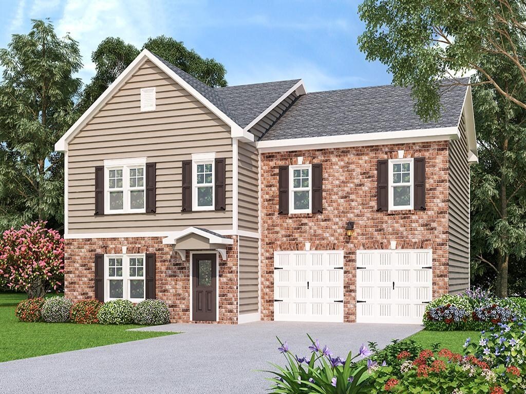 170 Chapel Heights Way, Unit 11 Covington, GA 30016 - Photo 1 of 1 a view of a white house next to a yard