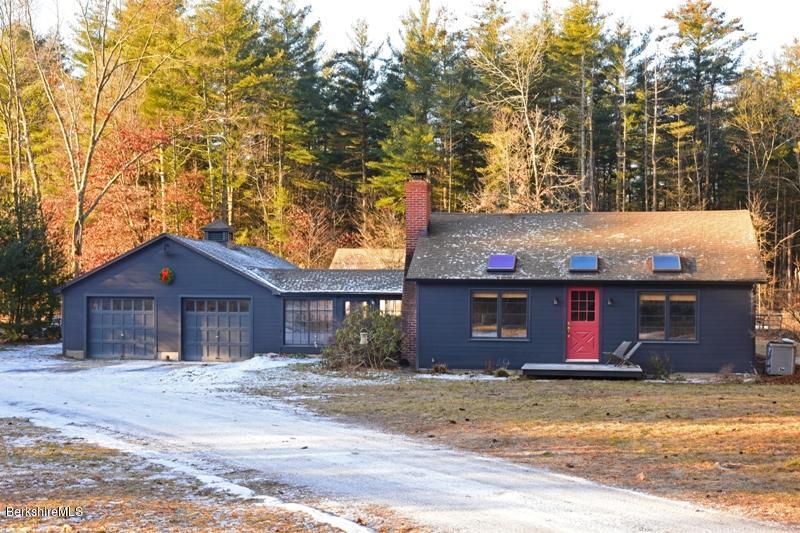 142 Polikoff Road Sheffield, MA 01222 - Photo 1 of 26 a front view of a house with a yard